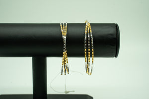Swirl Design Two- Tone 22k Gold Set of 2 Bangles