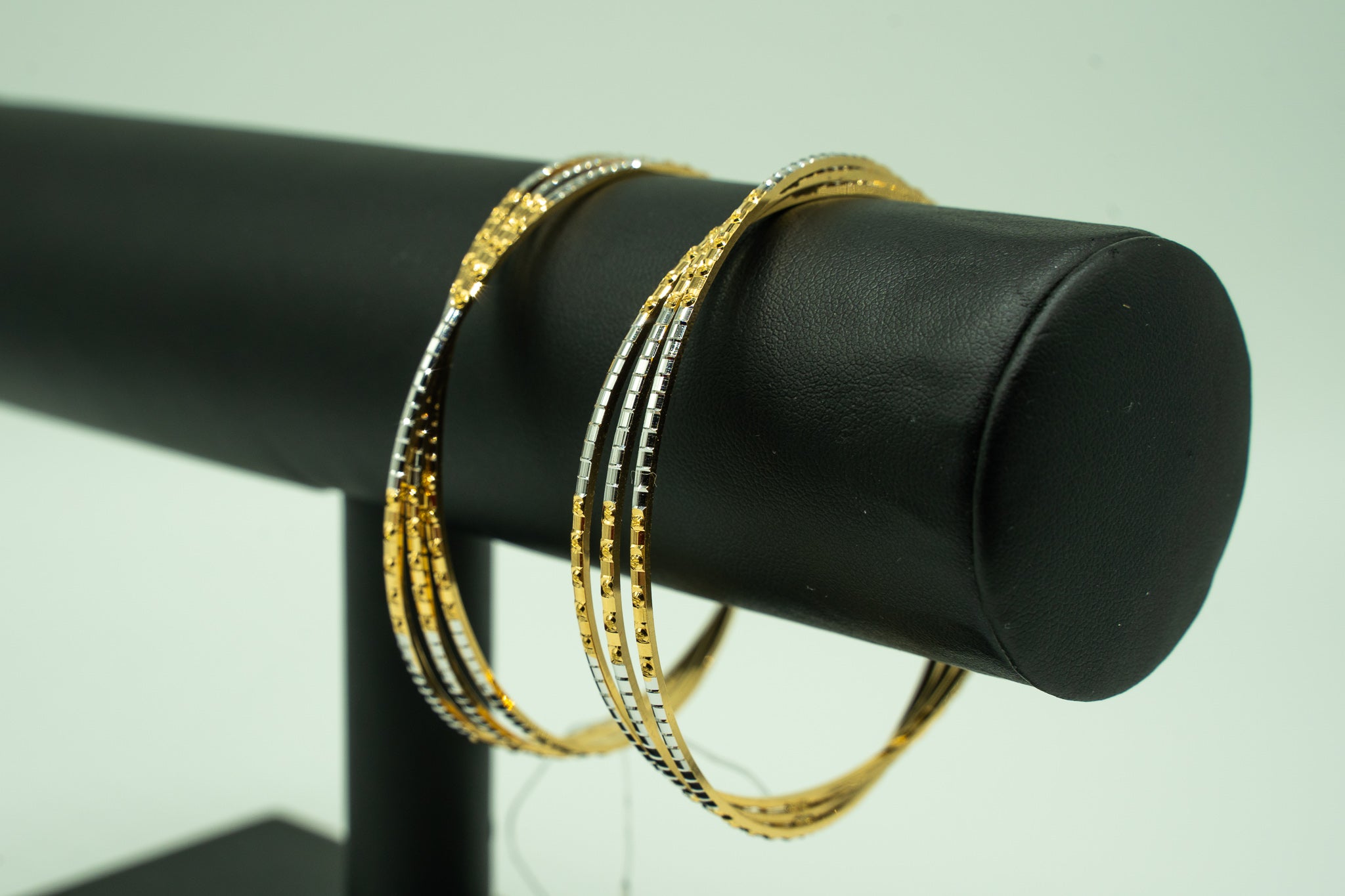 Swirl Design Two- Tone 22k Gold Set of 2 Bangles