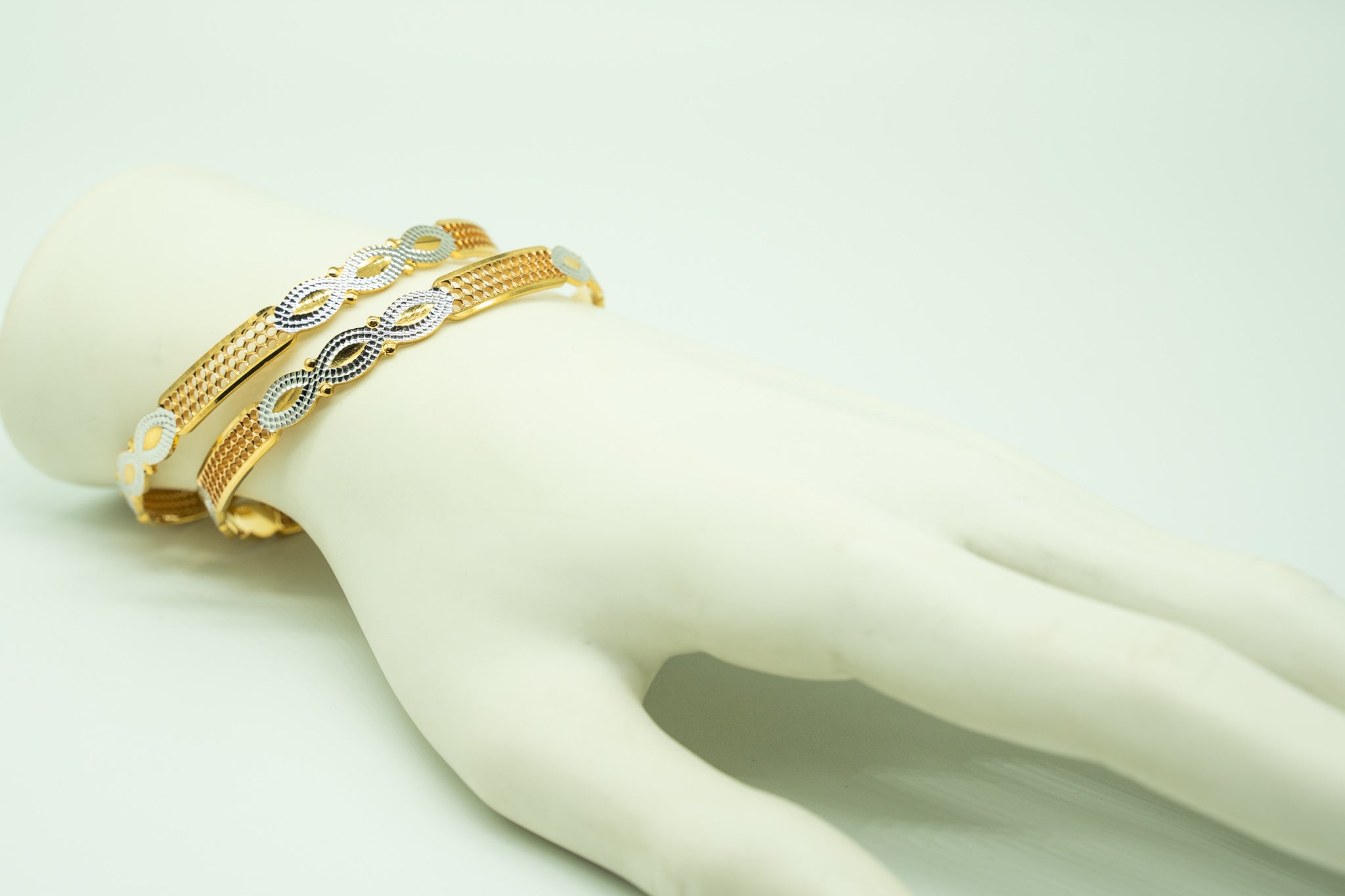 Infinity Design- Two Toned 22k Gold Set of 4 Bangles